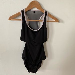 Black leo with violet trim